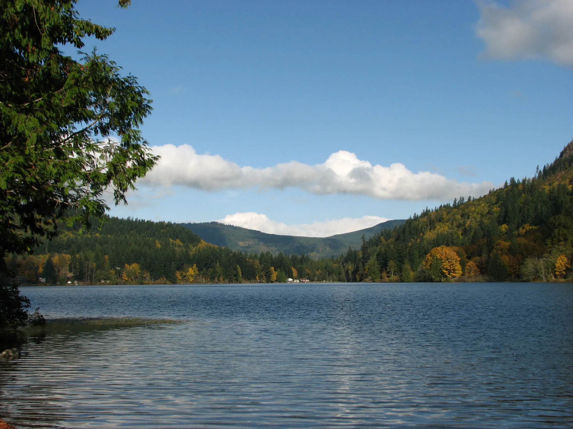Silver Lake near Maple Falls with forested hills and an autumn shoreline